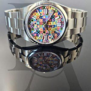 Rolex Oyster Perpetual 41 | 134300-0010 | 彩色紀念花紋錶面
